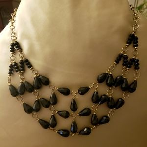 Matching black necklace and earring set
